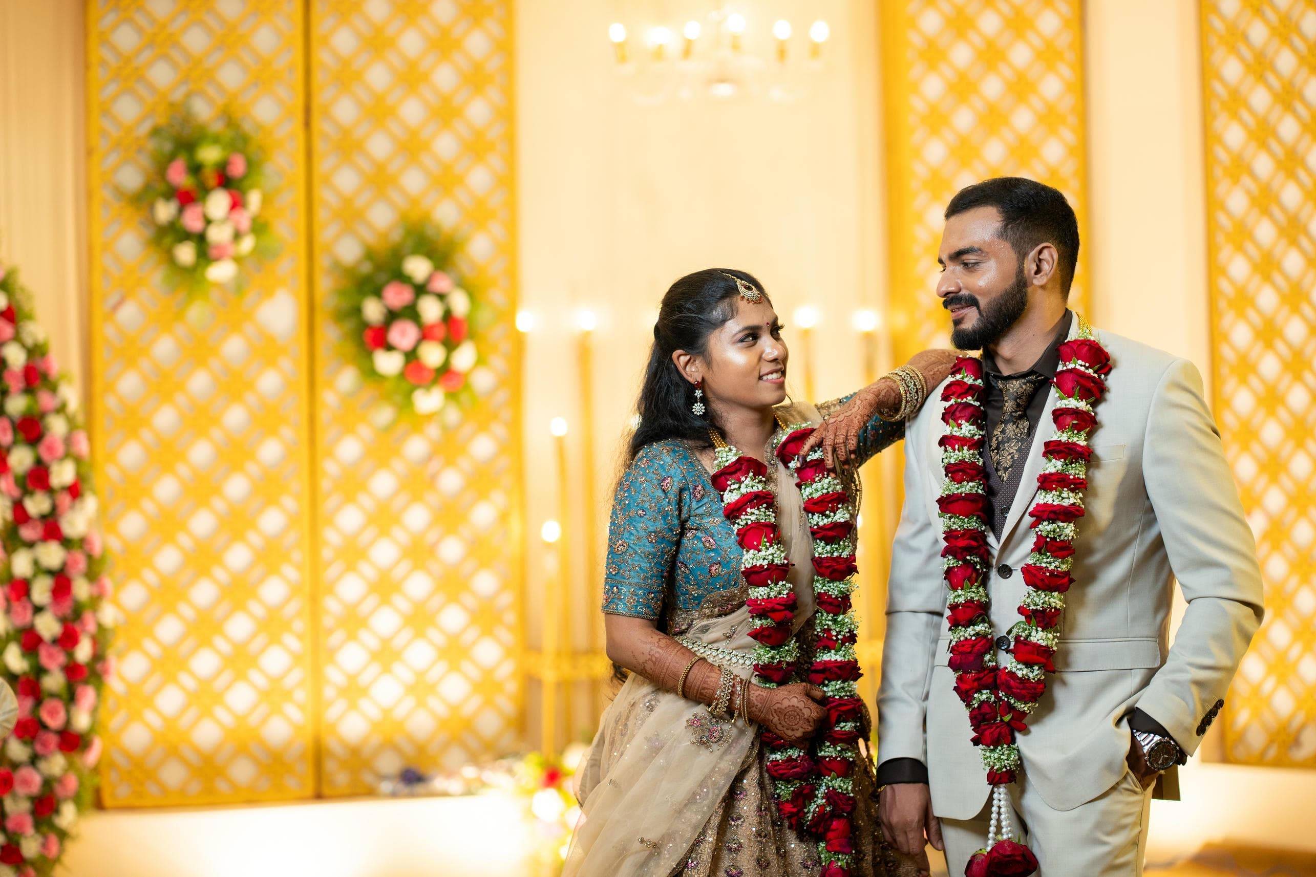 Romantic pose with wedding backdrop decorations