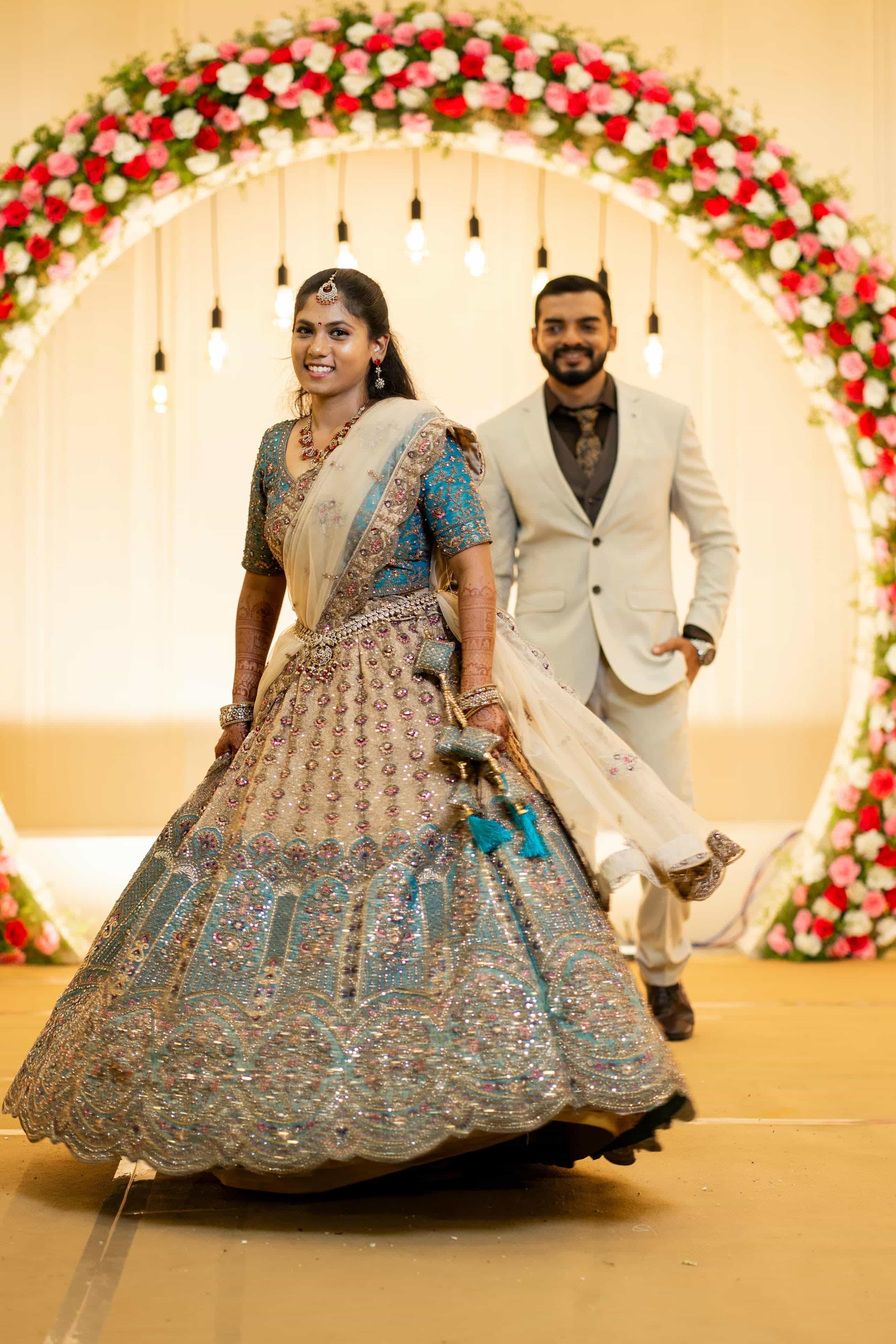 Joyful couple pose during wedding celebration