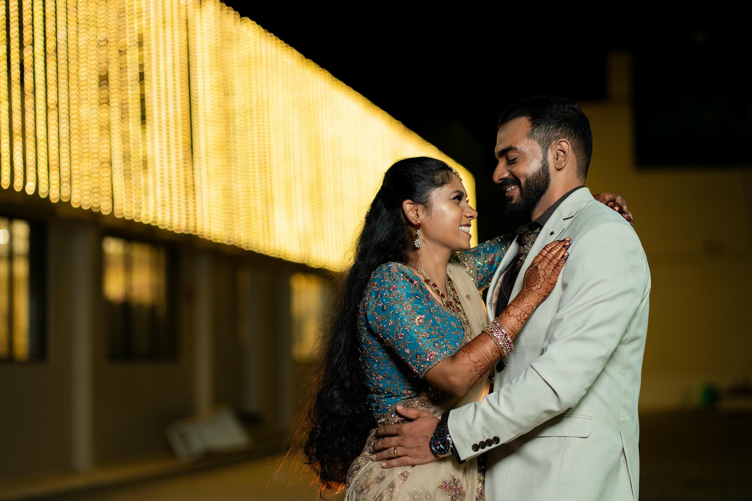 Joyful newlywed couple posing together