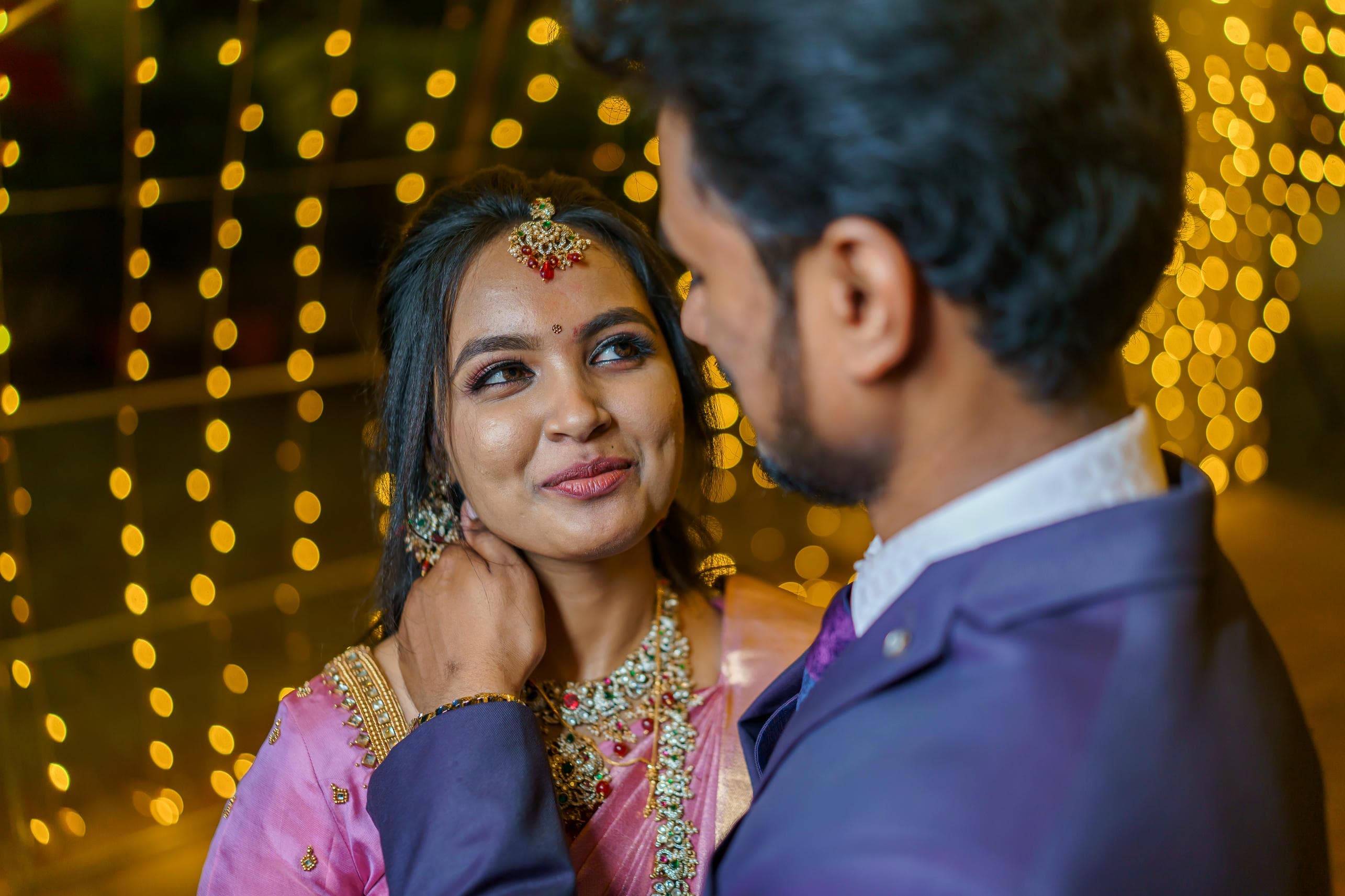 Bride and groom sharing romantic glance