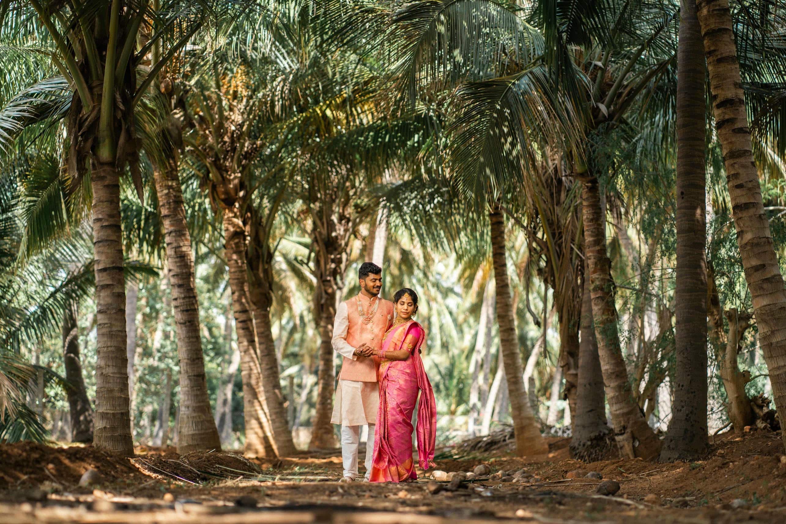 Candid wedding photoshoot capturing romantic hand holding moment