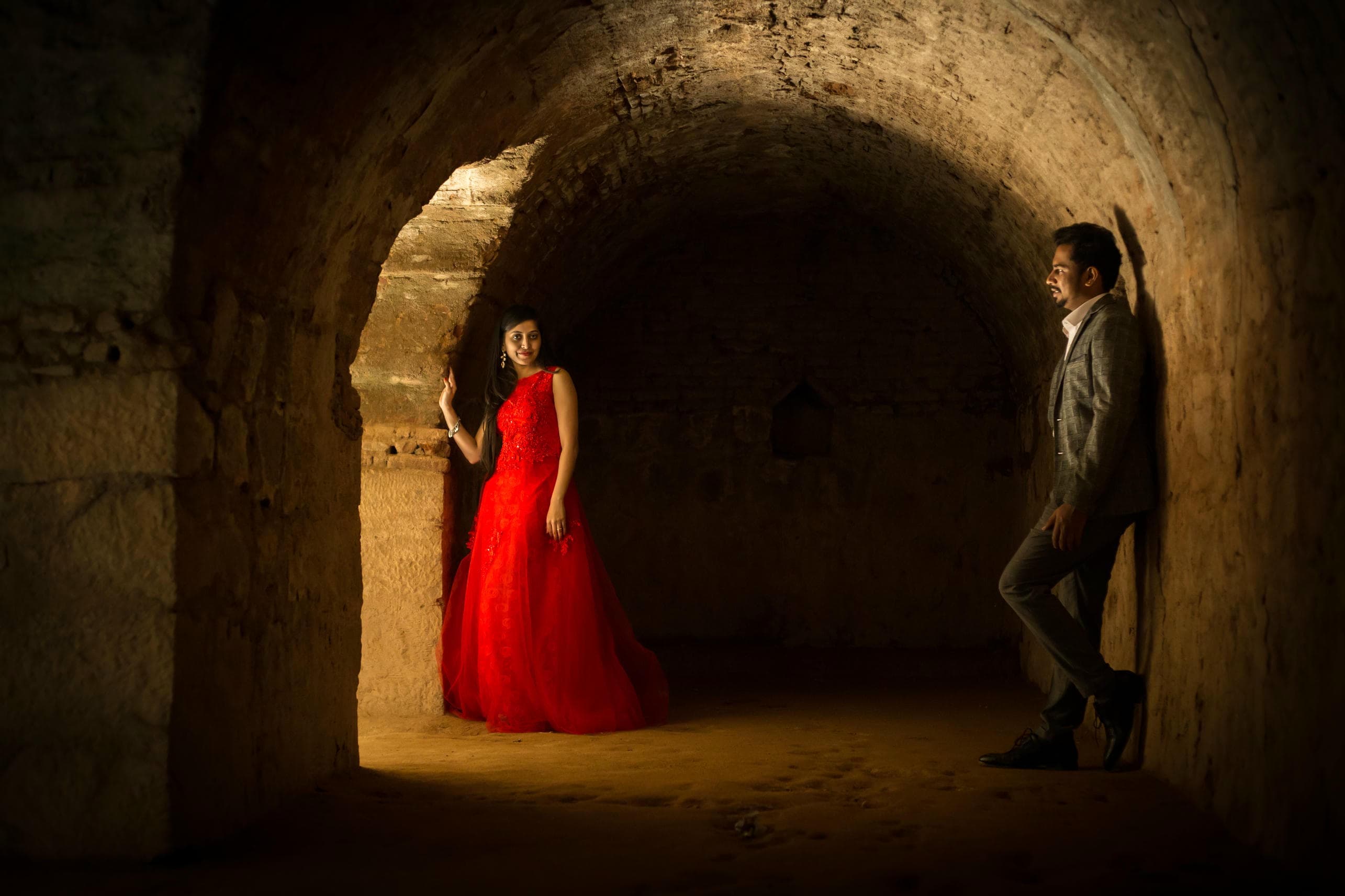 Couple standing inside the tunnel