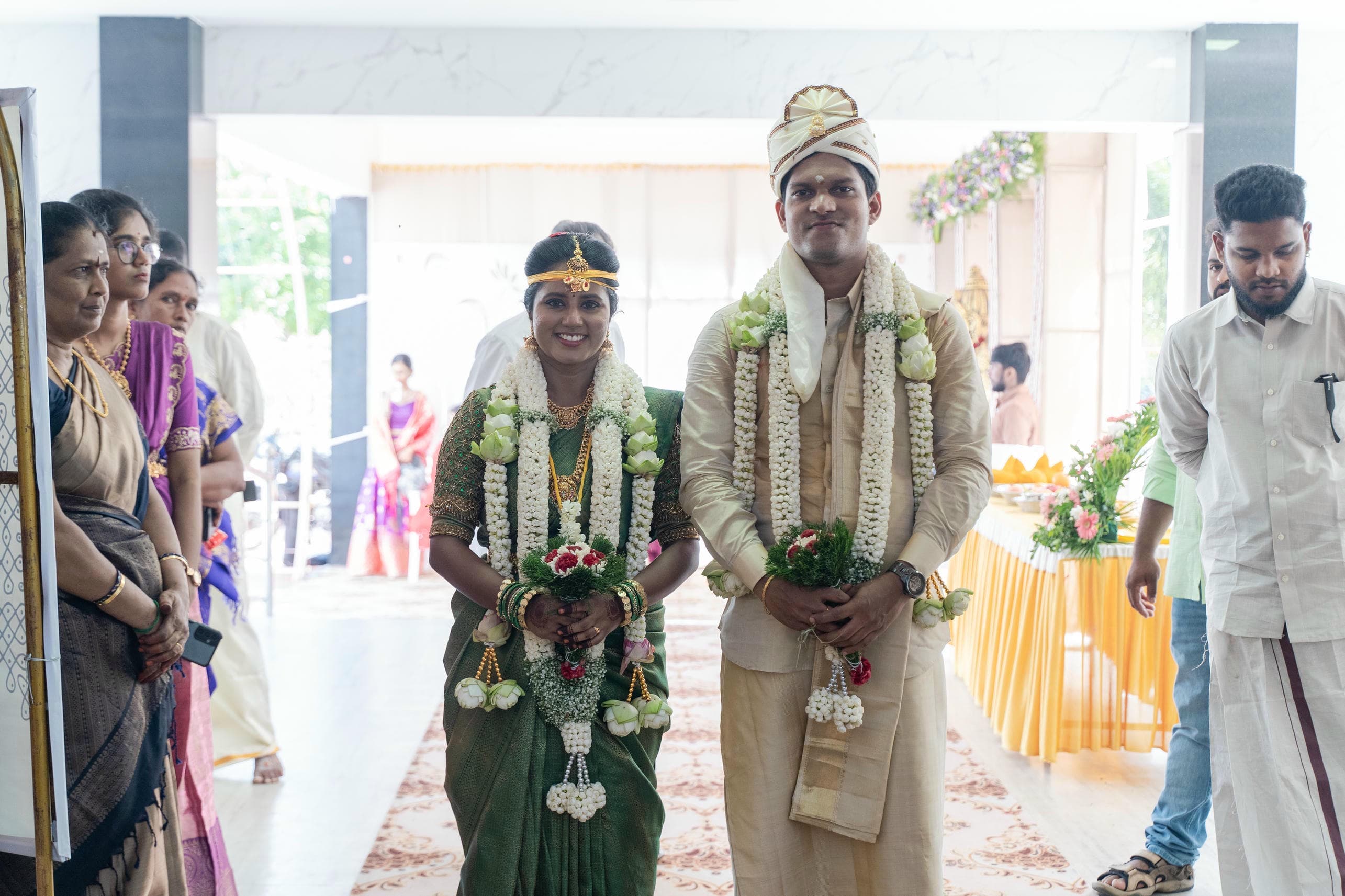 Joyful bride and groom celebrating with family around